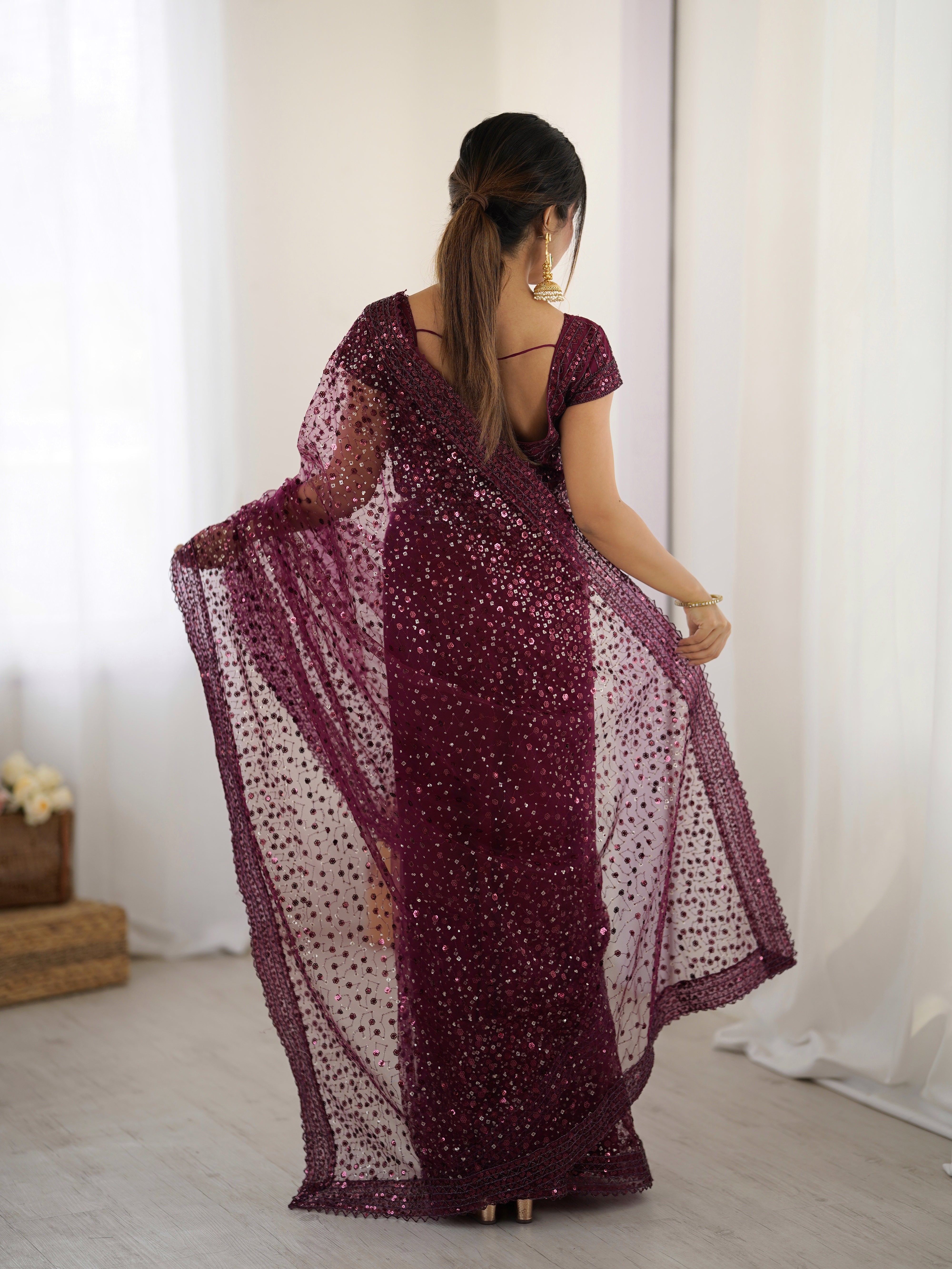 Party wear designer zari sequence soft net saree