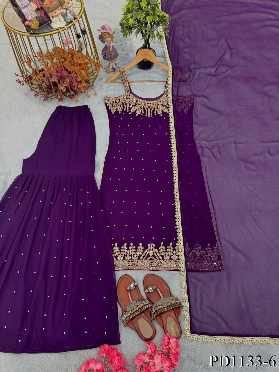 Beautifull Faux Georgette Hand Work Top Plazzo