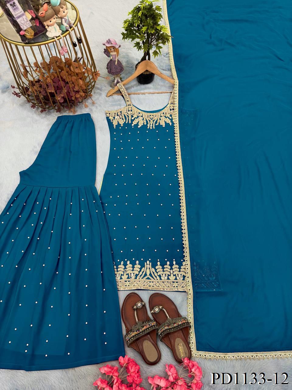 Beautifull Faux Georgette Hand Work Top Plazzo