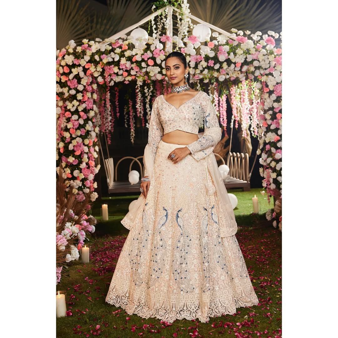 Premium Soft Butterfly Net Lehenga Embellished With Beautiful Multy Thread Embroidery Work