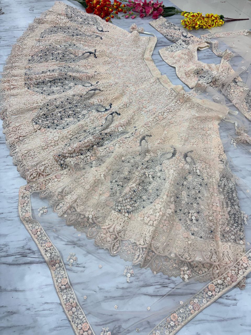 Premium Soft Butterfly Net Lehenga Embellished With Beautiful Multy Thread Embroidery Work