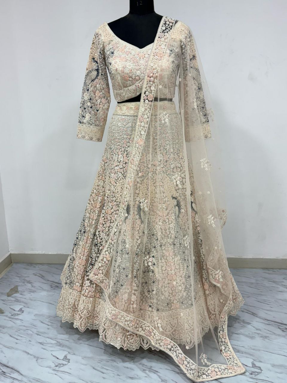 Premium Soft Butterfly Net Lehenga Embellished With Beautiful Multy Thread Embroidery Work