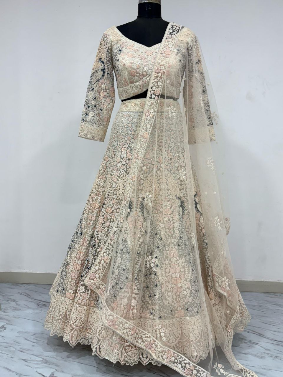 Premium Soft Butterfly Net Lehenga Embellished With Beautiful Multy Thread Embroidery Work