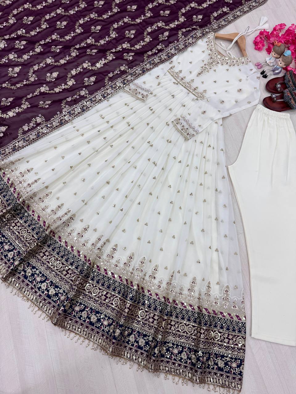 Heavy faux Geogette Micro Cotton With Fancy Latkan Border With Sleeve With Tassels Gown