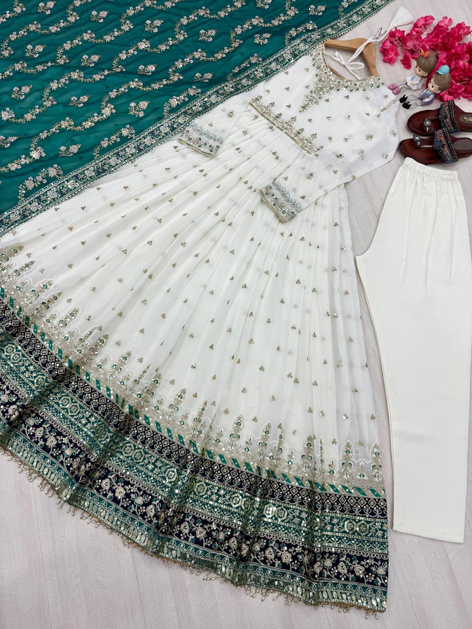 Heavy faux Geogette Micro Cotton With Fancy Latkan Border With Sleeve With Tassels Gown