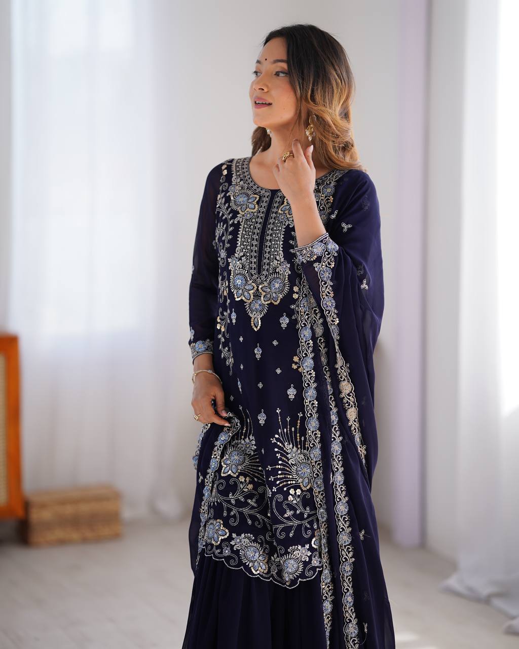 Blue Colour Georrgette Sequence With Thred Work Top With Sharara And Dupatta